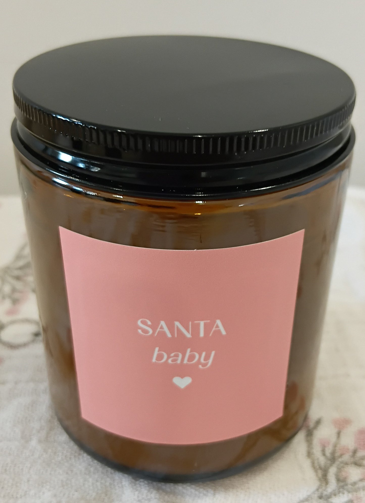 Santa Baby cedar leaf and fruity clove soy candle.
