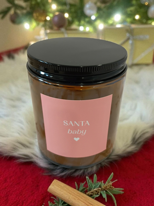 Santa Baby cedar leaf and fruity clove soy candle.